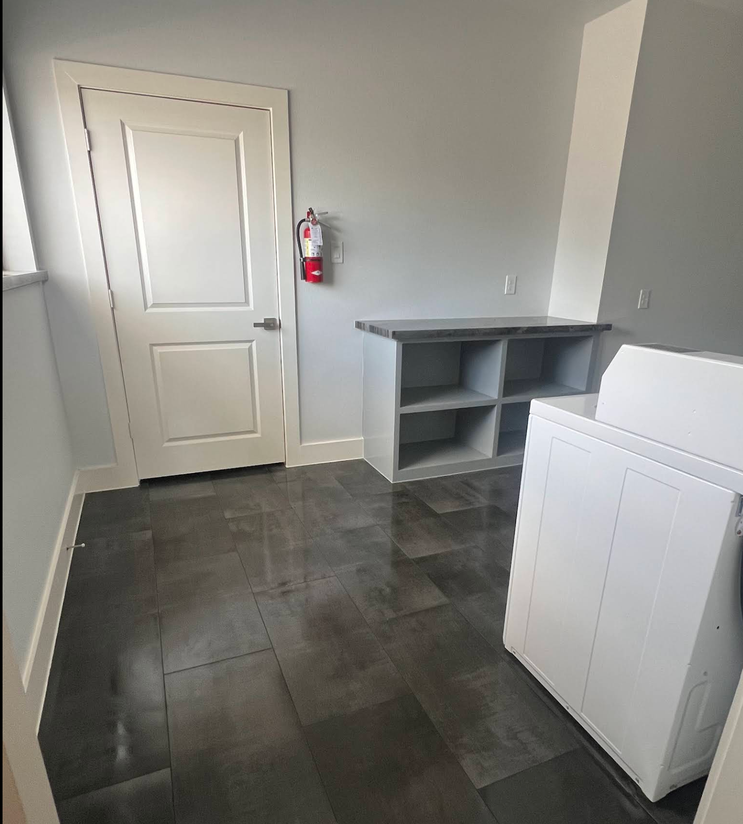 Folding counter and storage inside the laundry facility